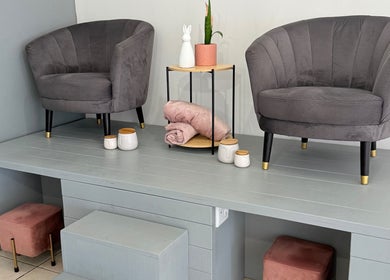 Elegant seating area at Derma Aesthetics, Walvis Bay, Erongo Region, NA enhances relaxation and comfort.