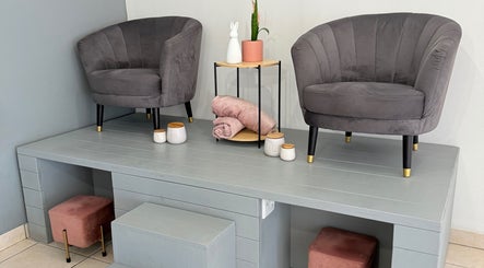 Elegant seating area at Derma Aesthetics, Walvis Bay, Erongo Region, NA enhances relaxation and comfort.