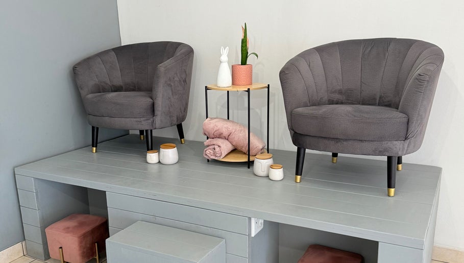 Elegant seating area at Derma Aesthetics, Walvis Bay, Erongo Region, NA with plush chairs and decor.