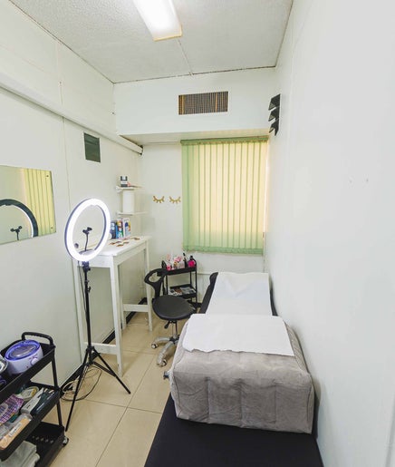 Treatment room at LashAura Beauty Spa in Kingston, St. Andrew Parish, JM with a bed and beauty tools.