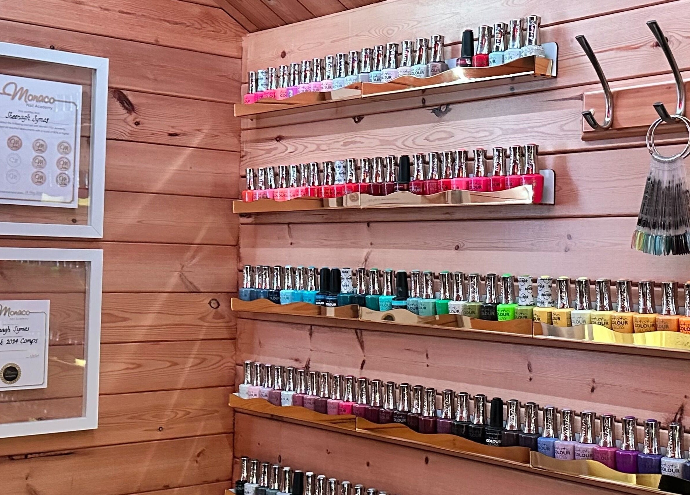 Nail polish collection at The Dolls House Nail Studio in Renwick, Marlborough, NZ showcasing vibrant colors.