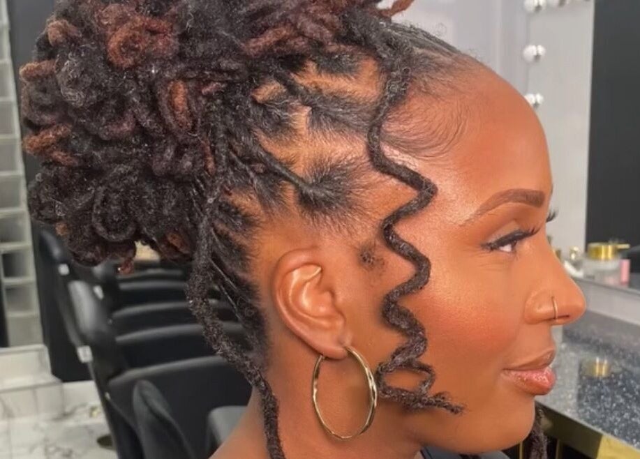 Intricate styled hair at Styledbyshan in South Croydon, England, GB, showcasing expert hair design.