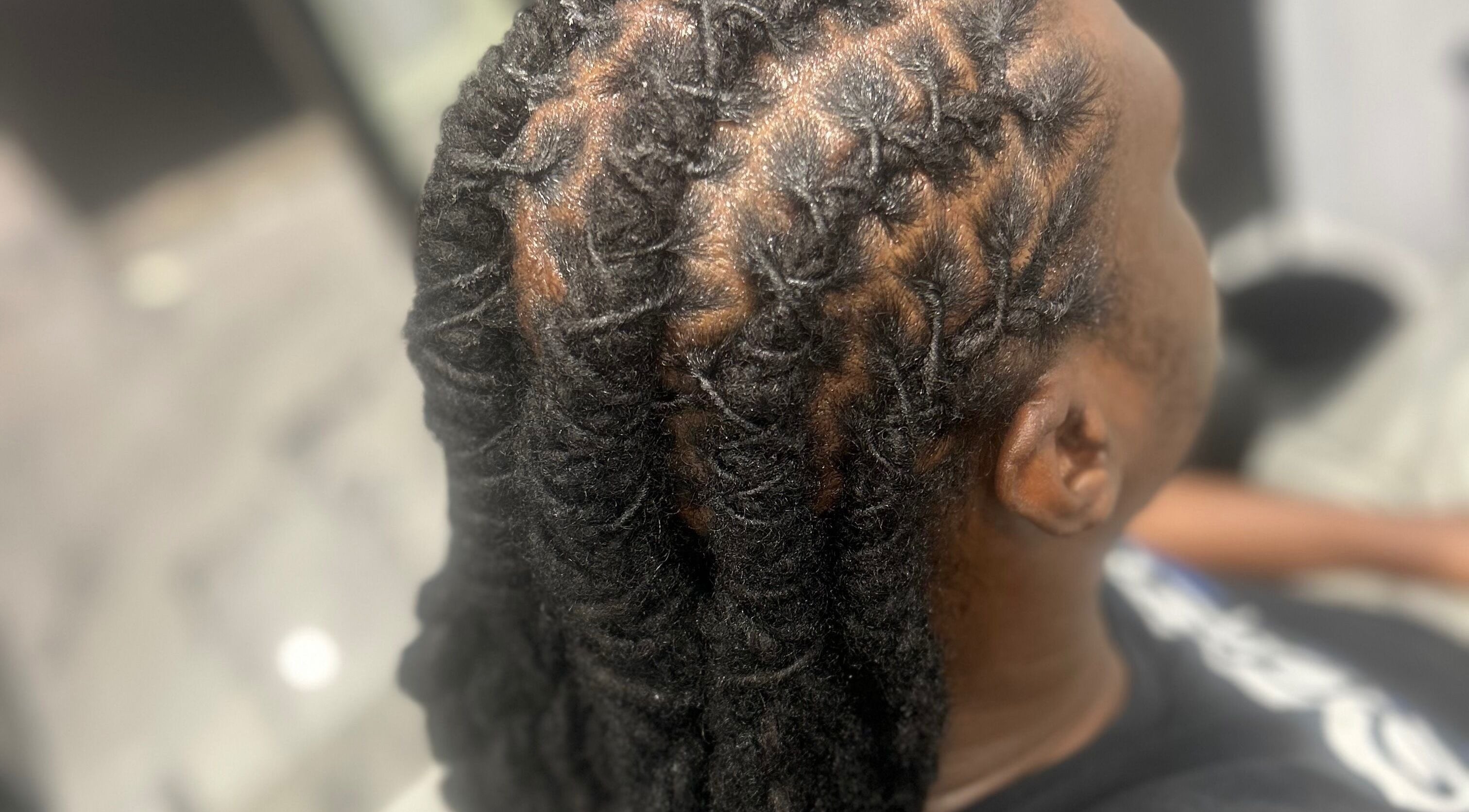 Stylish braided hairstyle at Styledbyshan, South Croydon, England, GB showcasing intricate patterns.