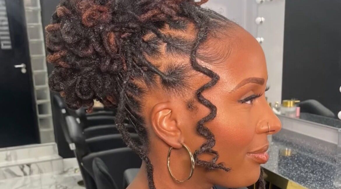 Styledbyshan in South Croydon, England, GB offers a beautiful intricate updo hairstyle reflecting expert styling.