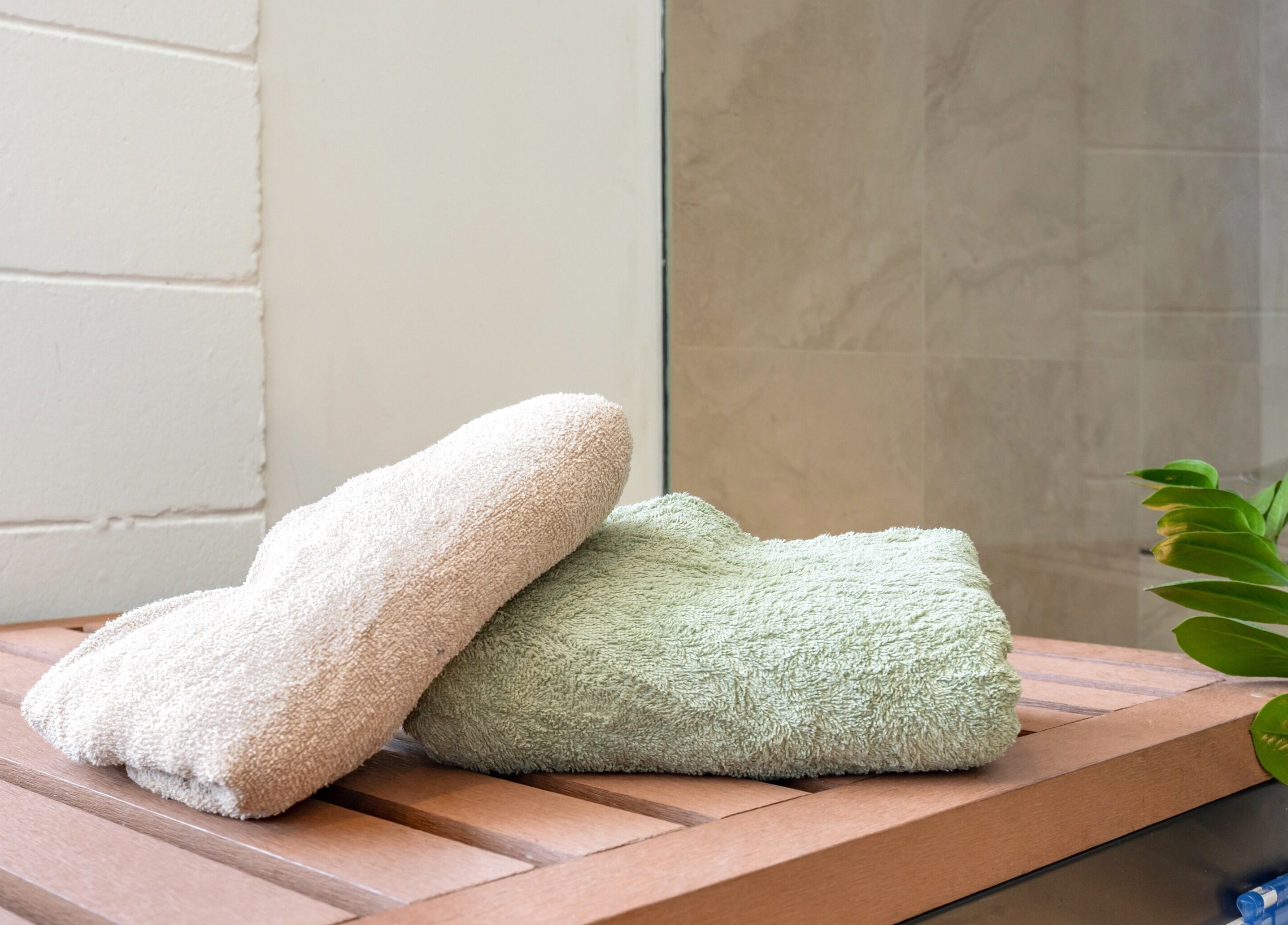 Folded towels at Sweat Chill Exhale in Caringbah, New South Wales, AU for a relaxing spa experience.