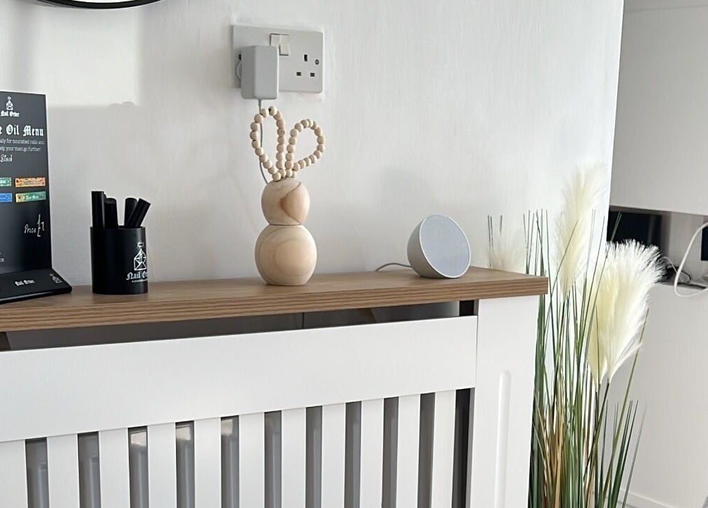 Stylish decor at Nails By Jess, St Austell, England, GB with a cuticle oil menu and modern design.