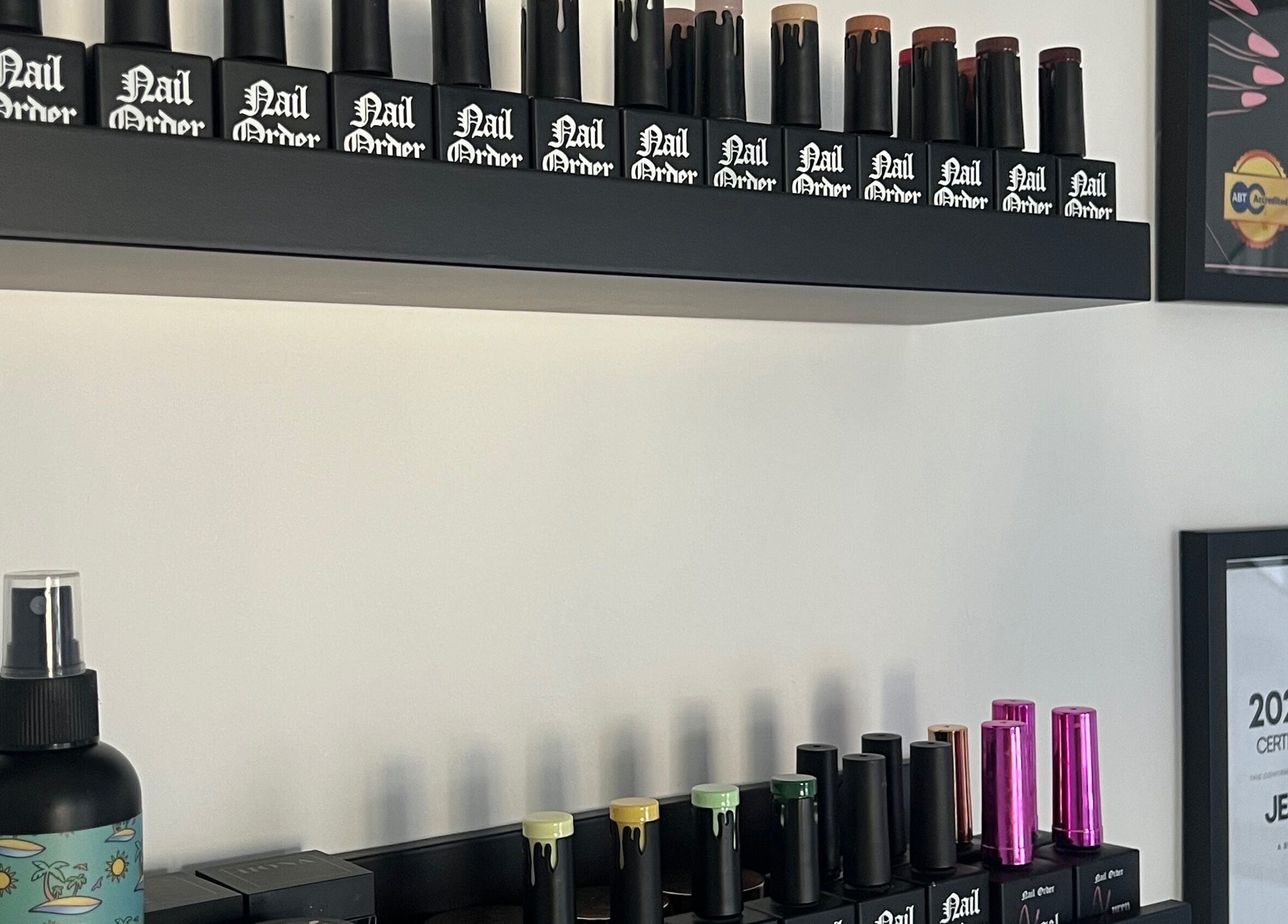 Chic nail polish selection on display at Nails By Jess, St Austell, England, GB, showcasing professional ambiance.