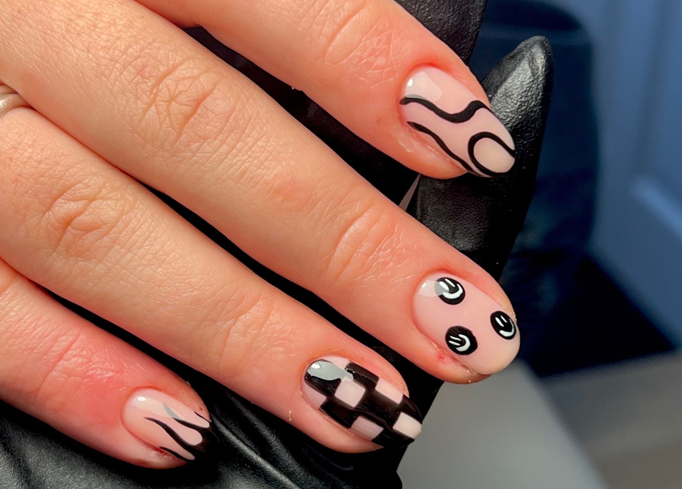 Intricate black and pink nail art at Nails By Jess, St Austell, England, GB.