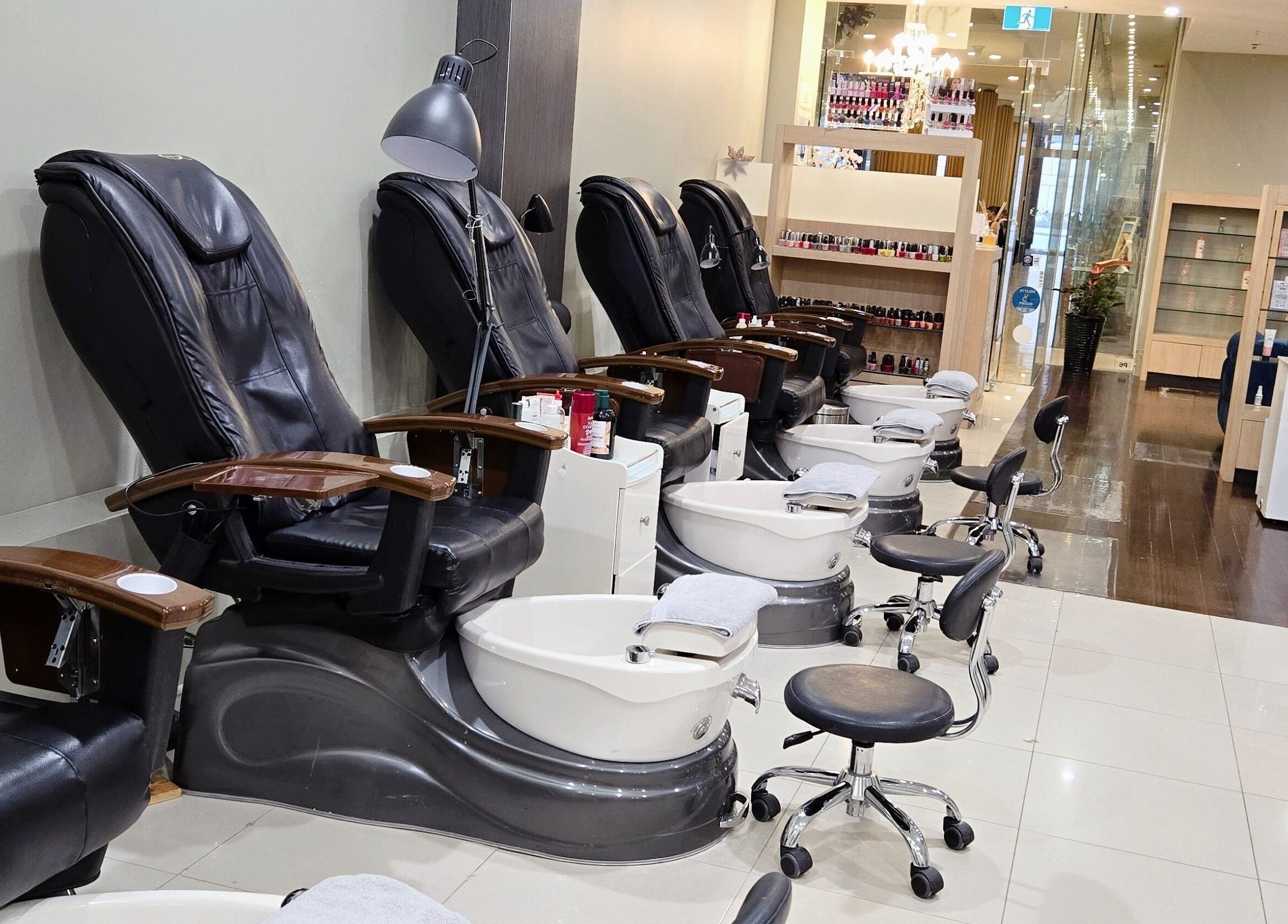 Comfortable pedicure chairs at Glow District Beauty in Sydney, New South Wales, AU offer a relaxing experience.