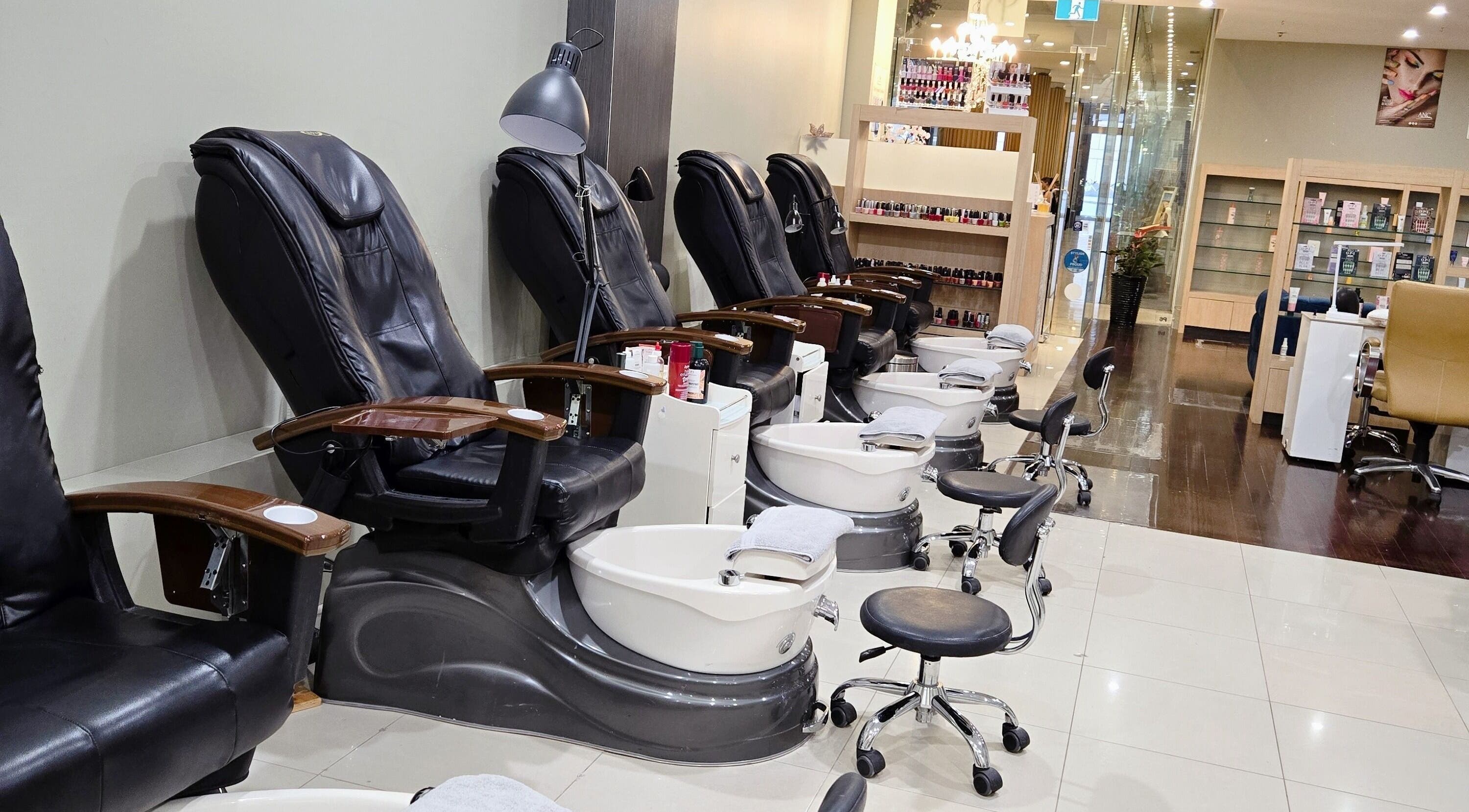 Comfortable pedicure chairs at Glow District Beauty in Sydney, New South Wales, AU offer a relaxing experience.