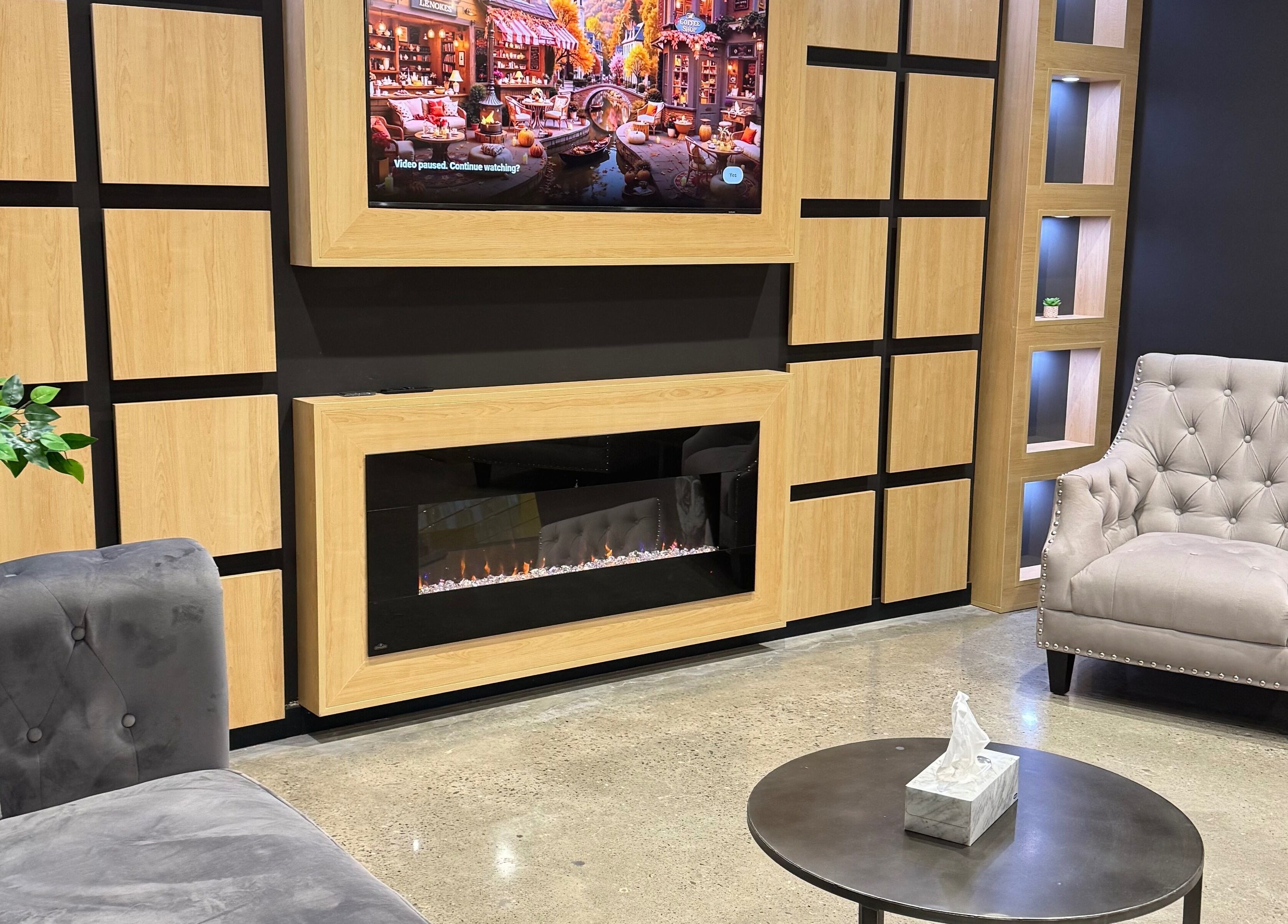 Elegant lounge area at LV Aestheticca, Toronto, Ontario, CA with plush seating and modern decor.