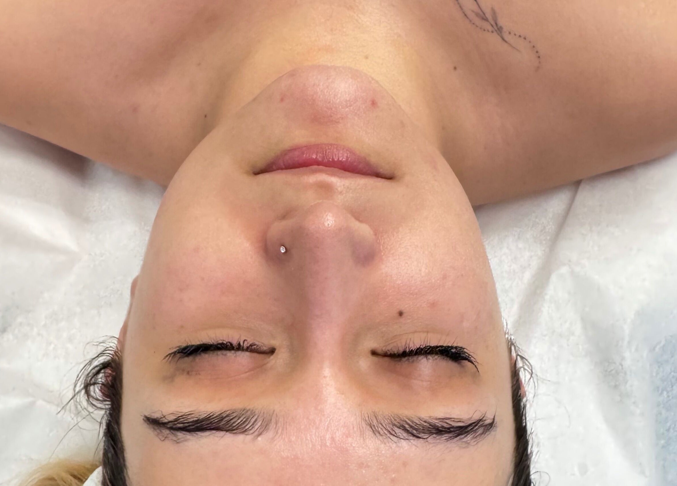 Facial treatment at LV Aestheticca in Toronto, Ontario, CA highlights natural beauty and relaxation.