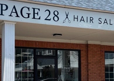 Front view of Page28 Hair Salon, Port Jefferson Station, New York, highlighting its chic exterior.