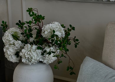 Elegant white hydrangeas in the tranquil setting of Page28 Hair Salon, Port Jefferson Station, New York, US.