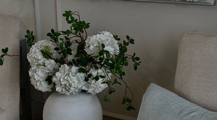 Elegant white hydrangeas in the tranquil setting of Page28 Hair Salon, Port Jefferson Station, New York, US.