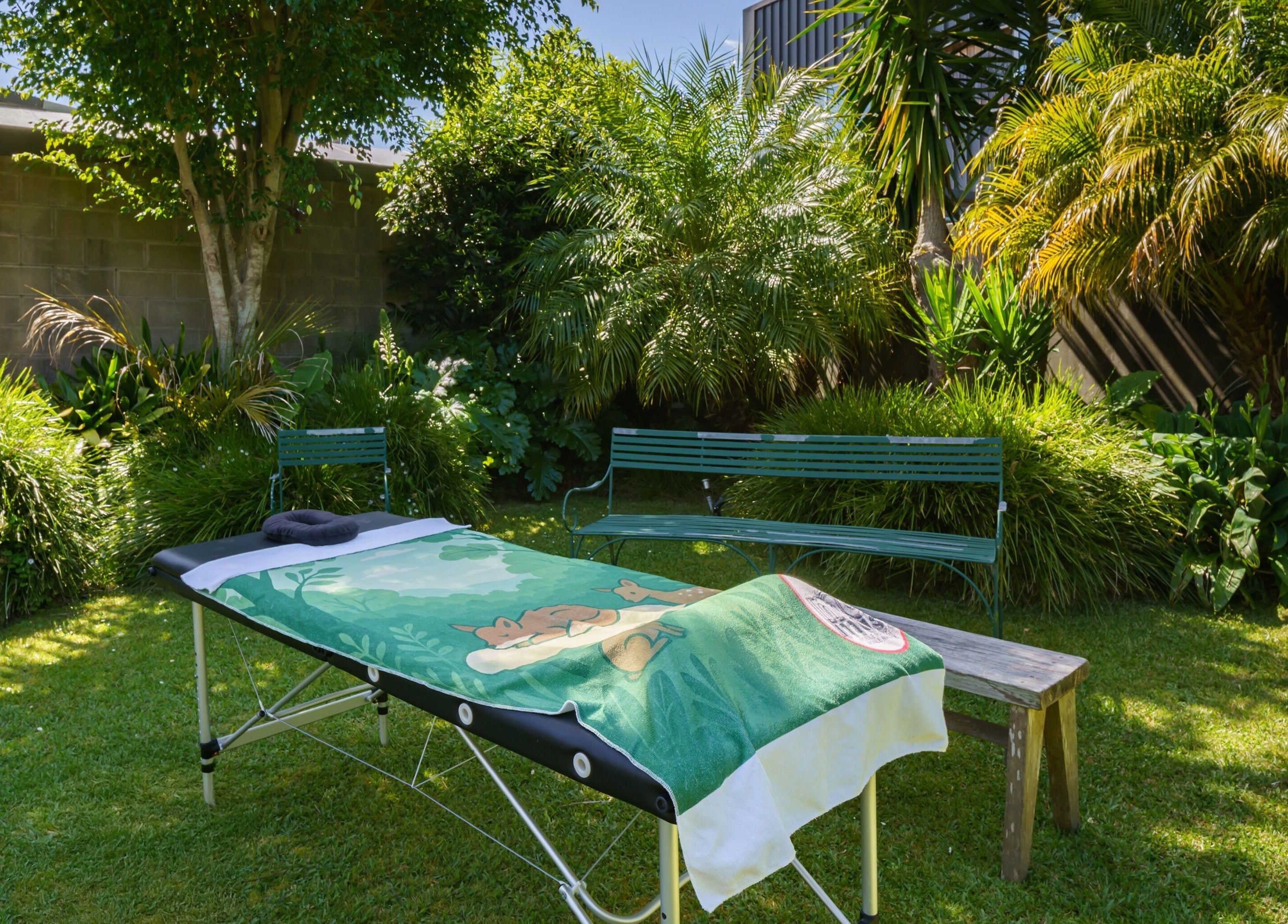 Massage table in a peaceful garden setting at Mob Mass- Mobile Massage Therapy, Auckland, Auckland, NZ.