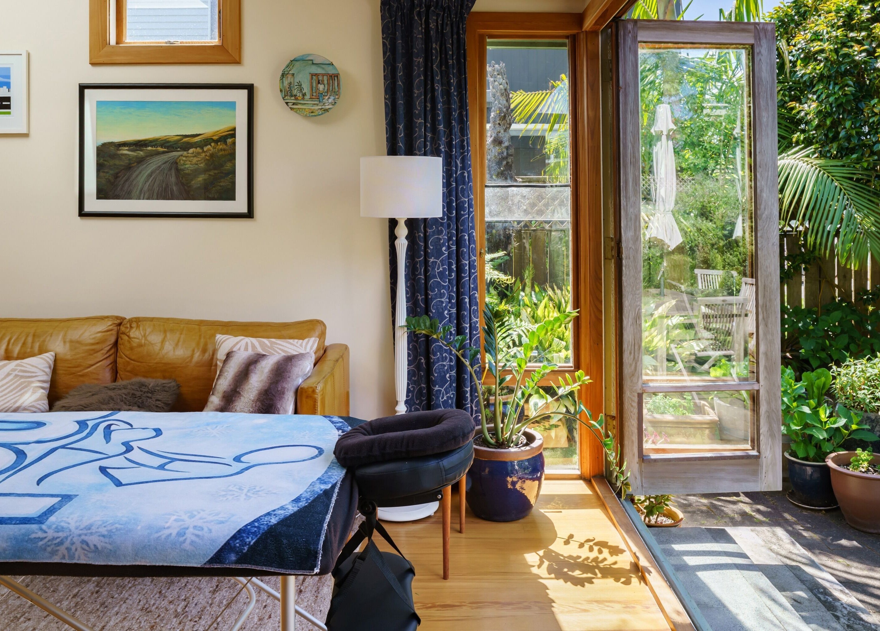 Cozy space at Mob Mass- Mobile Massage Therapy in Auckland, offering tranquil indoor-outdoor ambiance.