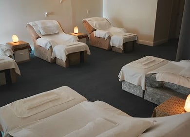 Tranquil relaxation area with massage chairs at Eden Spa Massage and Facial in Pembroke Pines, Florida, US.
