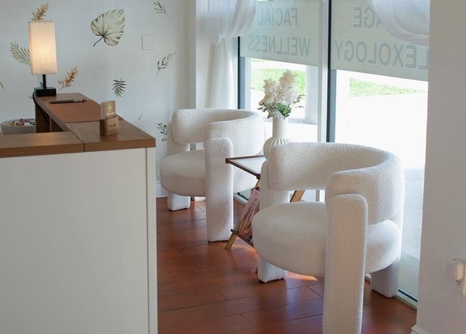 Cozy waiting area with plush chairs at Eden Spa Massage and Facial, Pembroke Pines, Florida, US.