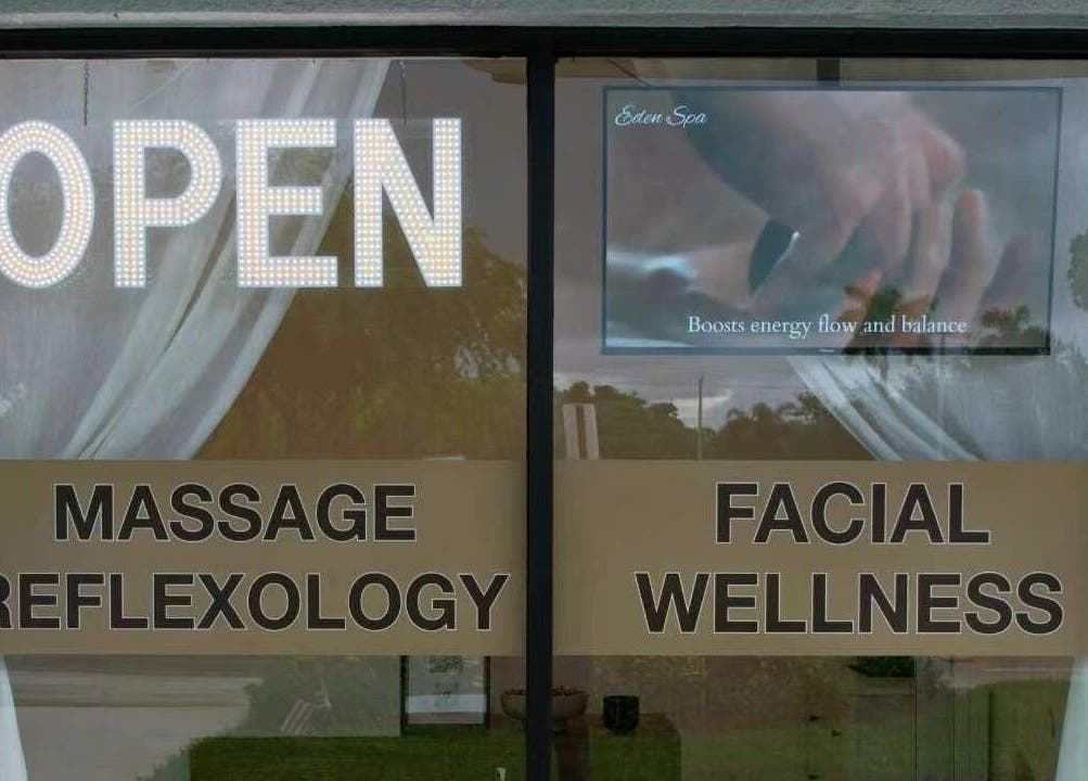 Entrance of Eden Spa Massage and Facial in Pembroke Pines, Florida, US with open sign and wellness services.