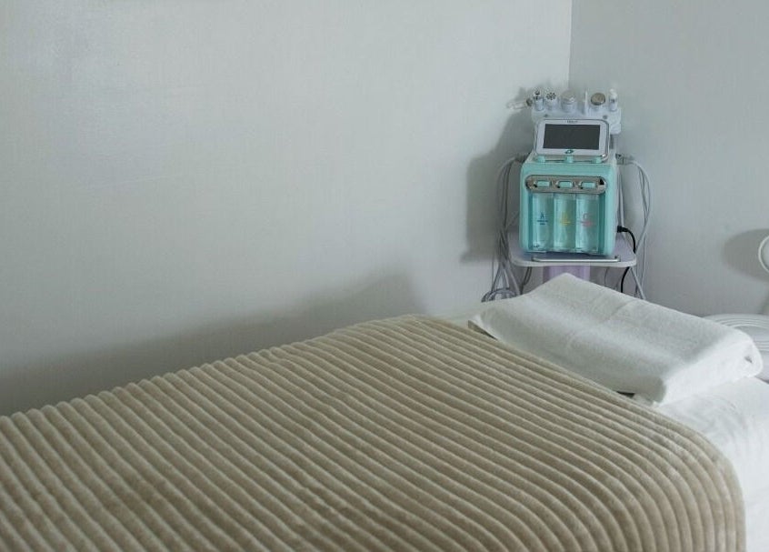 Relaxing massage room at Eden Spa Massage and Facial, Pembroke Pines, Florida, US, featuring serene decor.