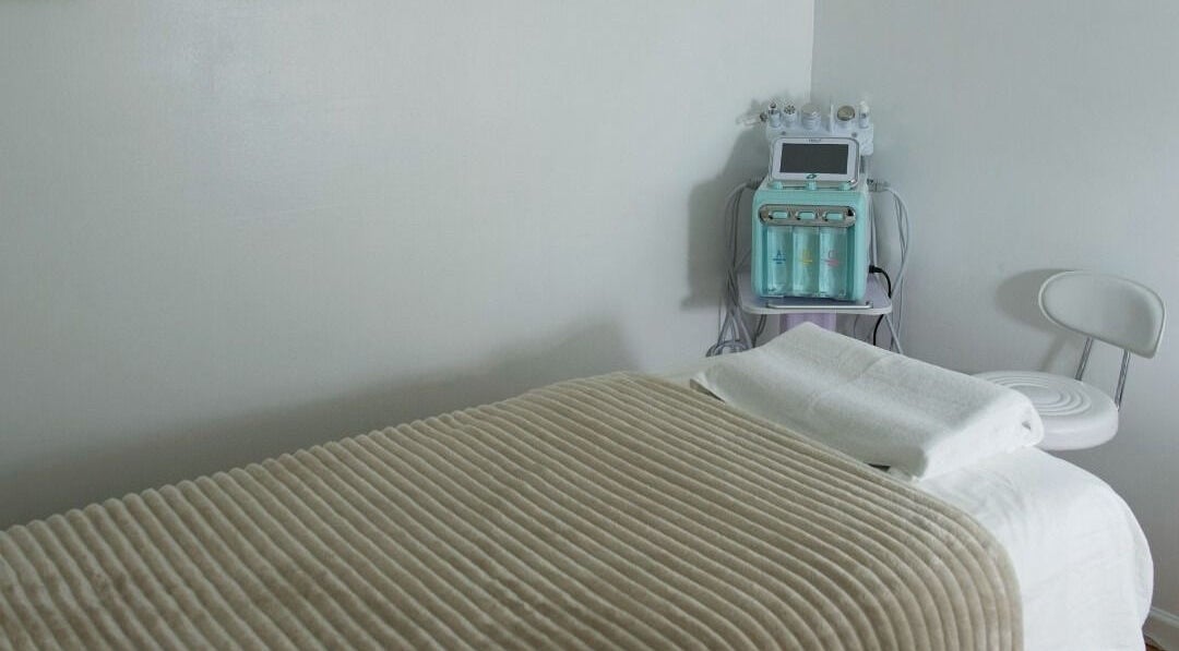 Relaxing massage room at Eden Spa Massage and Facial, Pembroke Pines, Florida, US, featuring serene decor.