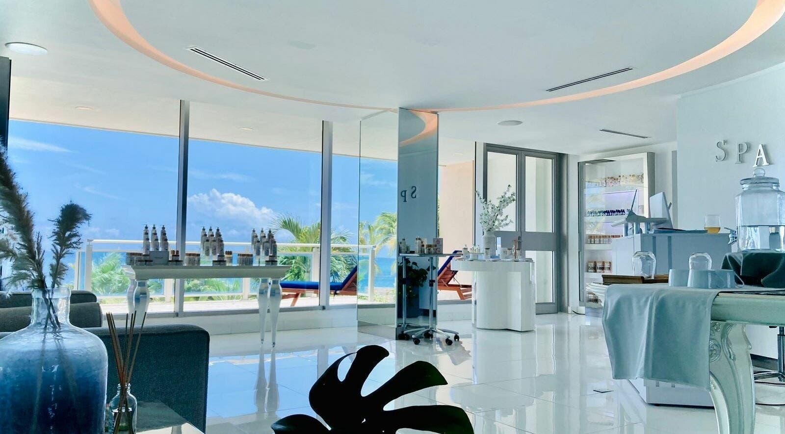 Chic interior of Nectar Spa at the Cliff, Sint Maarten, SX with ocean view and wellness products.