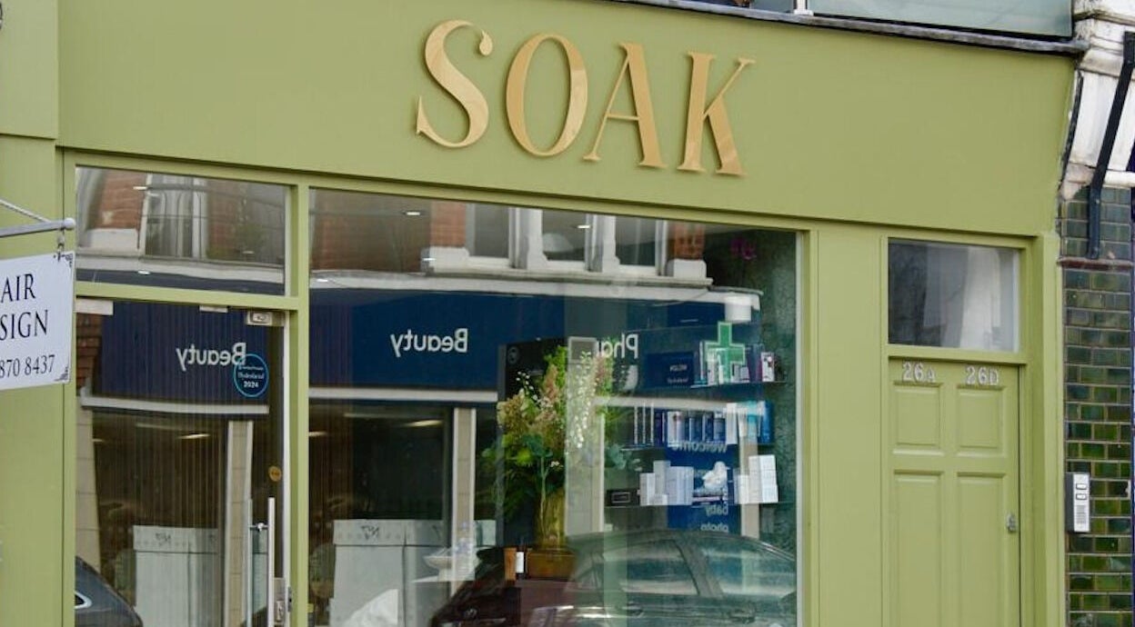 Front view of SOAK beauty venue showcasing its modern storefront in London, England, GB.