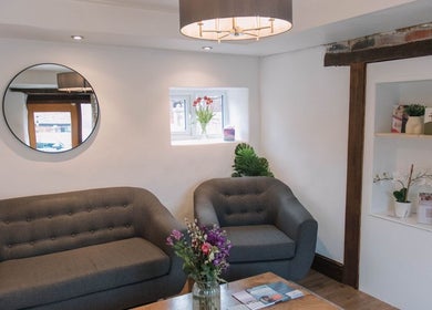 Cozy lounge area at The Pumphouse- Glendon Lodge Farm Kettering, Kettering, England, GB featuring modern decor.