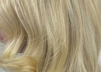 Smooth blonde locks expertly styled at Angel Locks, Bournemouth, England, GB.
