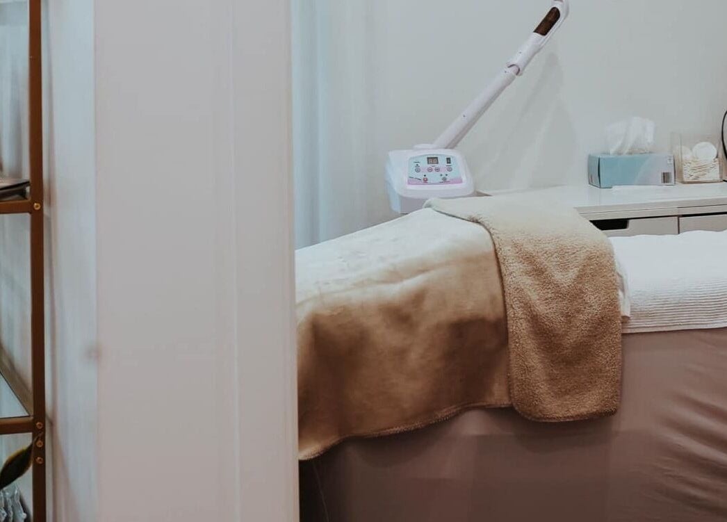 Lux Aesthetics By Sophie's tranquil treatment room in Narellan, New South Wales, AU, featuring a comfy spa bed.