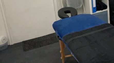 Peaceful massage room at Attiva Massage Therapy, Cardiff, Wales, GB with a relaxing massage table.