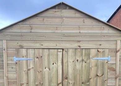 Wooden structure at Attiva Massage Therapy, Cardiff, Wales, GB, highlighting natural charm and tranquility.