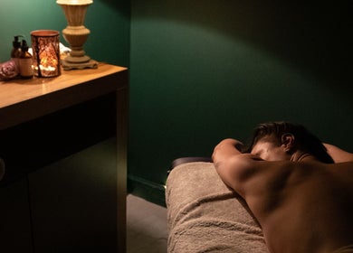 Relaxing massage at The Galpals Collective, Douglas, Douglas, IM featuring candlelit ambiance and peaceful setting.
