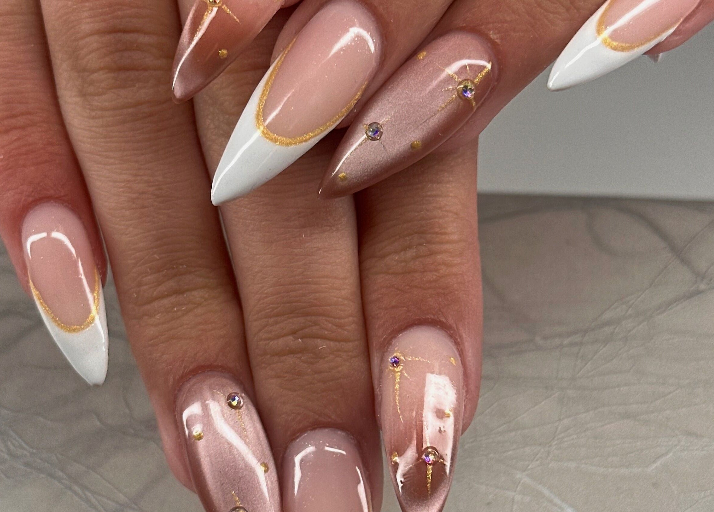 Chic nail art with gems and white tips at Honey & Clove Nails, Sylvan Lake, Alberta, CA.