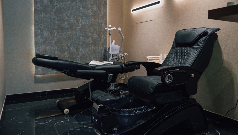 Comfortable reclining chair at Generation Gentleman Barbershop, Dubai, AE, offering premium grooming services.
