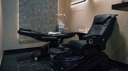 Comfortable reclining chair at Generation Gentleman Barbershop, Dubai, AE, offering premium grooming services.