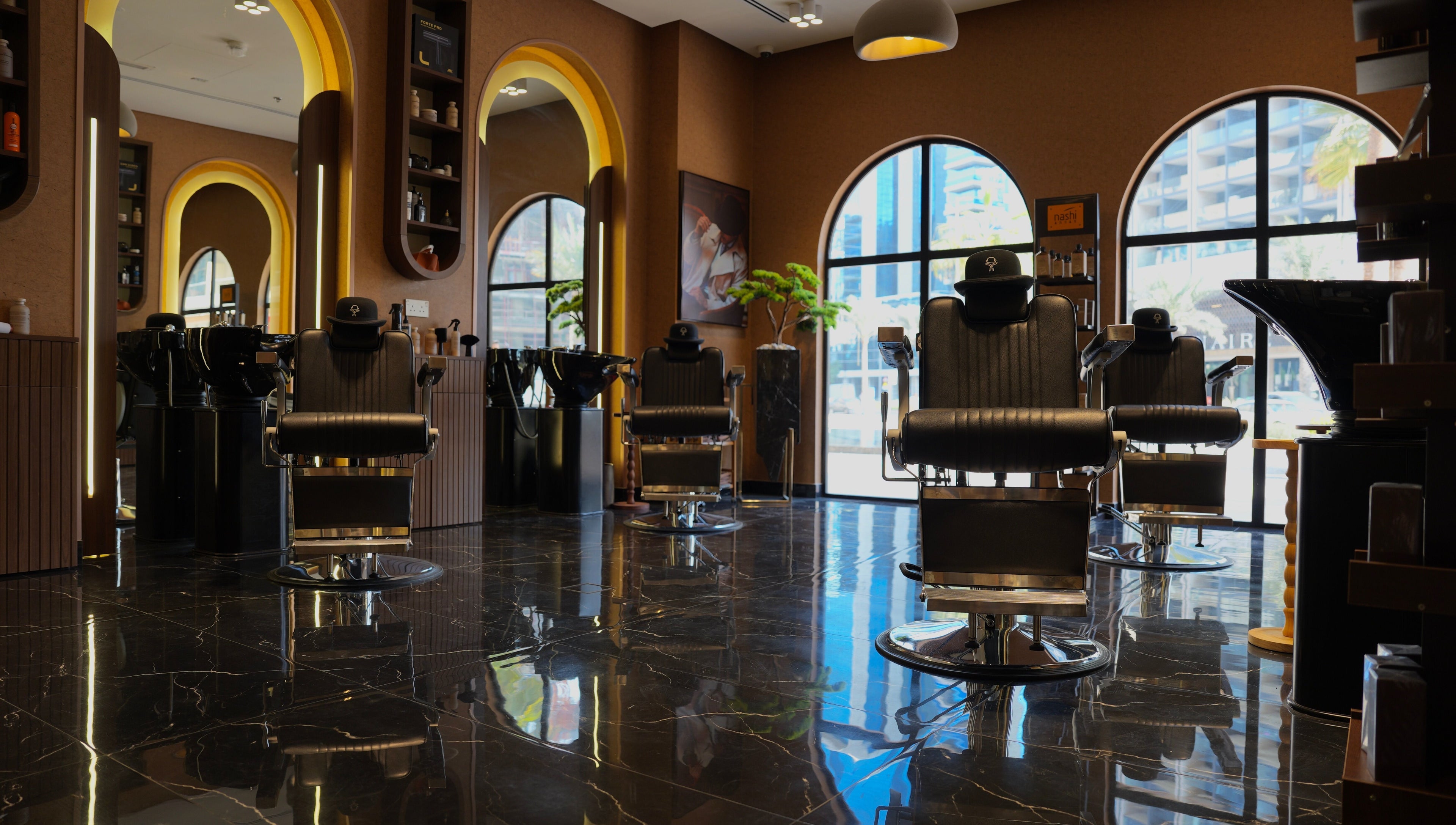 Elegant seating area at Generation Gentleman Barbershop, دبي, دبي, AE with stylish chairs and modern decor.