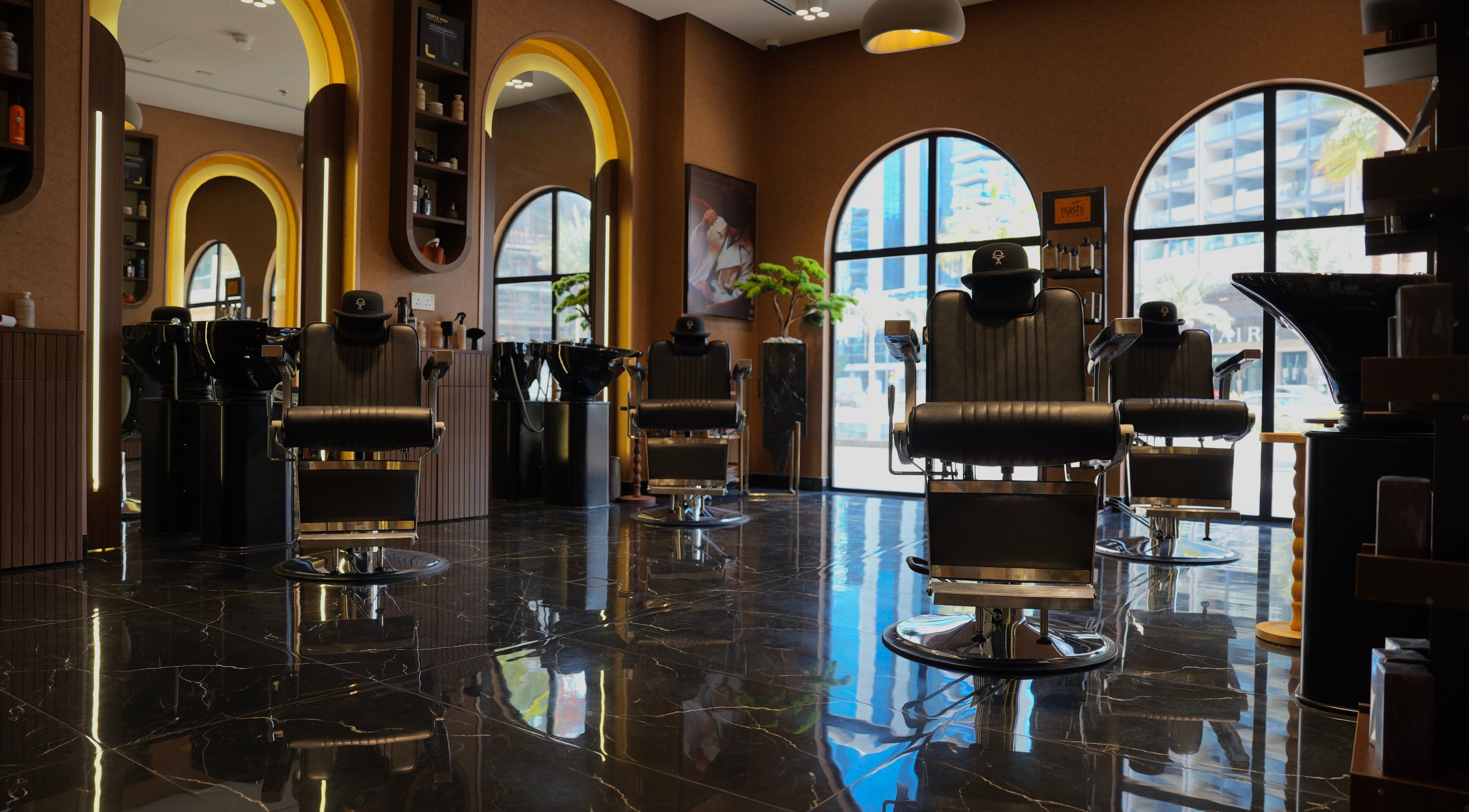 Elegant seating area at Generation Gentleman Barbershop, دبي, دبي, AE with stylish chairs and modern decor.