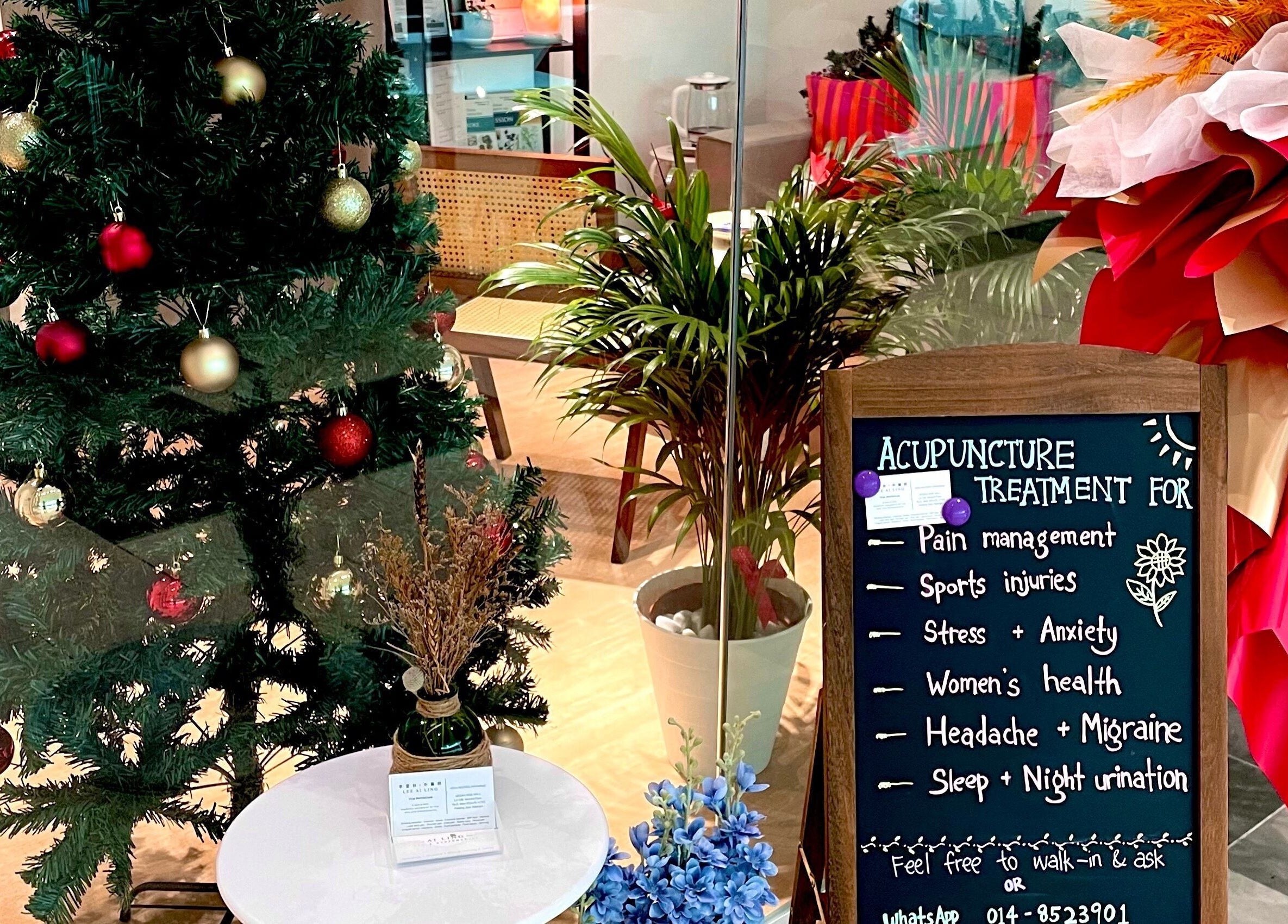 Decorative Christmas setup at Ai Ling TCM & Acupuncture, Petaling Jaya, Selangor, MY showcasing treatments.