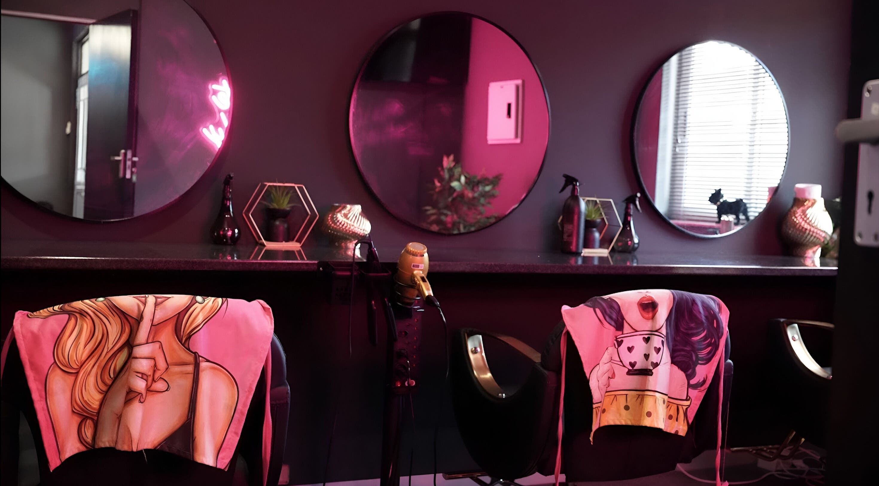 Stylish salon chairs with artistic covers at Plush Head Spa, Cape Town, Western Cape, ZA.