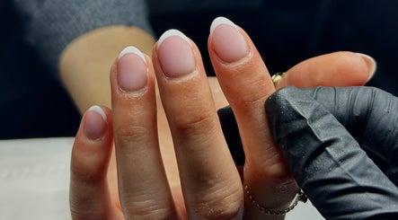 Elegant French manicure at Beauty By Caitlin, Chalford, England, GB, showcasing precise nail artistry.
