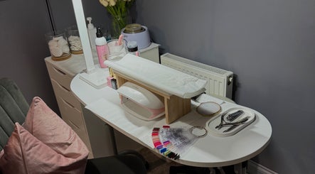 Elegant nail treatment setup at Beauty By Caitlin, Chalford, England, GB, showcasing tools and ambiance.