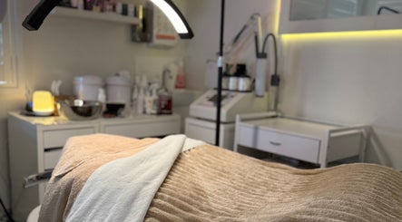 Cozy treatment room at Jeanette N Beauty Therapist, Wakerley, Queensland, AU, showcasing a welcoming spa bed.