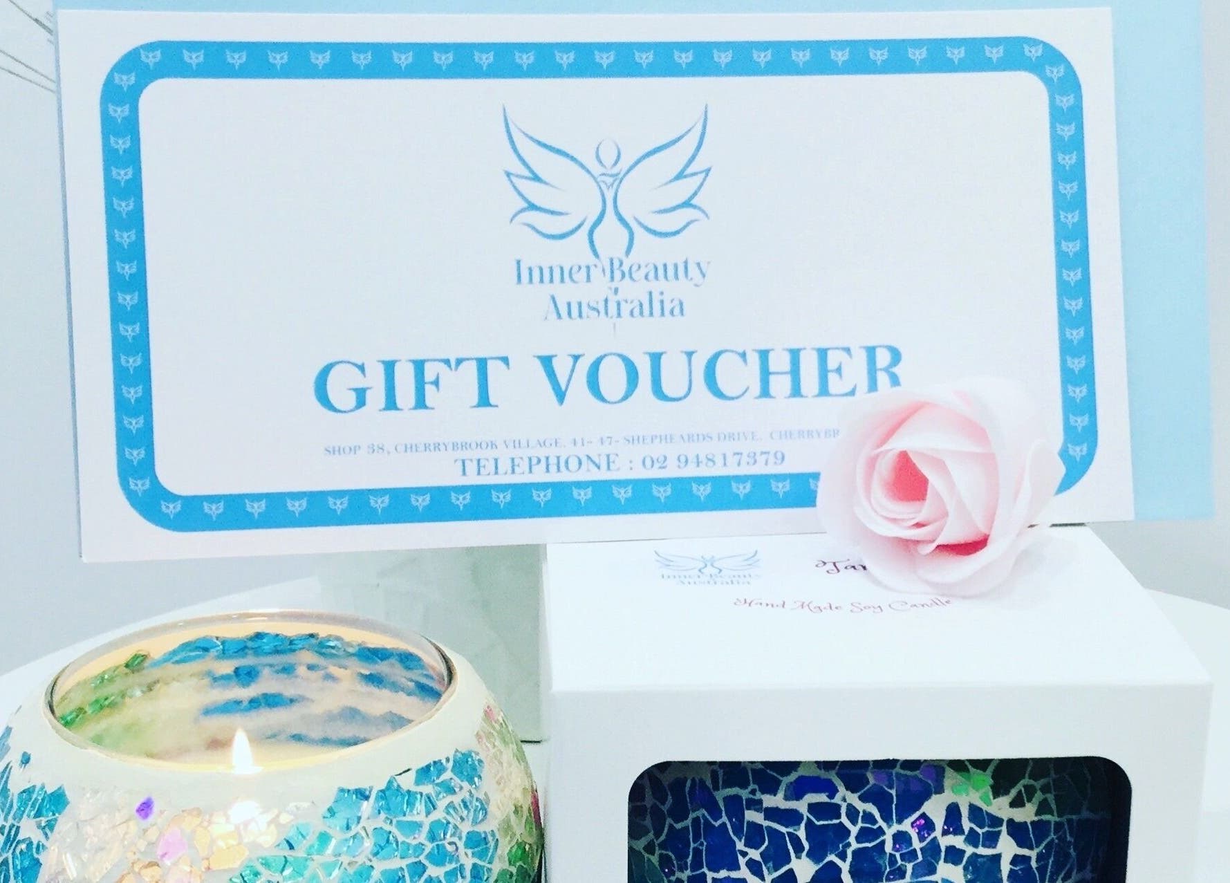 Gift voucher and candle from Inner Beauty Australia, Beecroft, New South Wales, AU offer a serene experience.