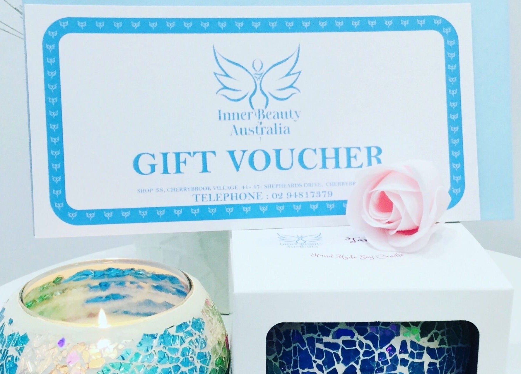 Gift voucher and candle from Inner Beauty Australia, Beecroft, New South Wales, AU offer a serene experience.