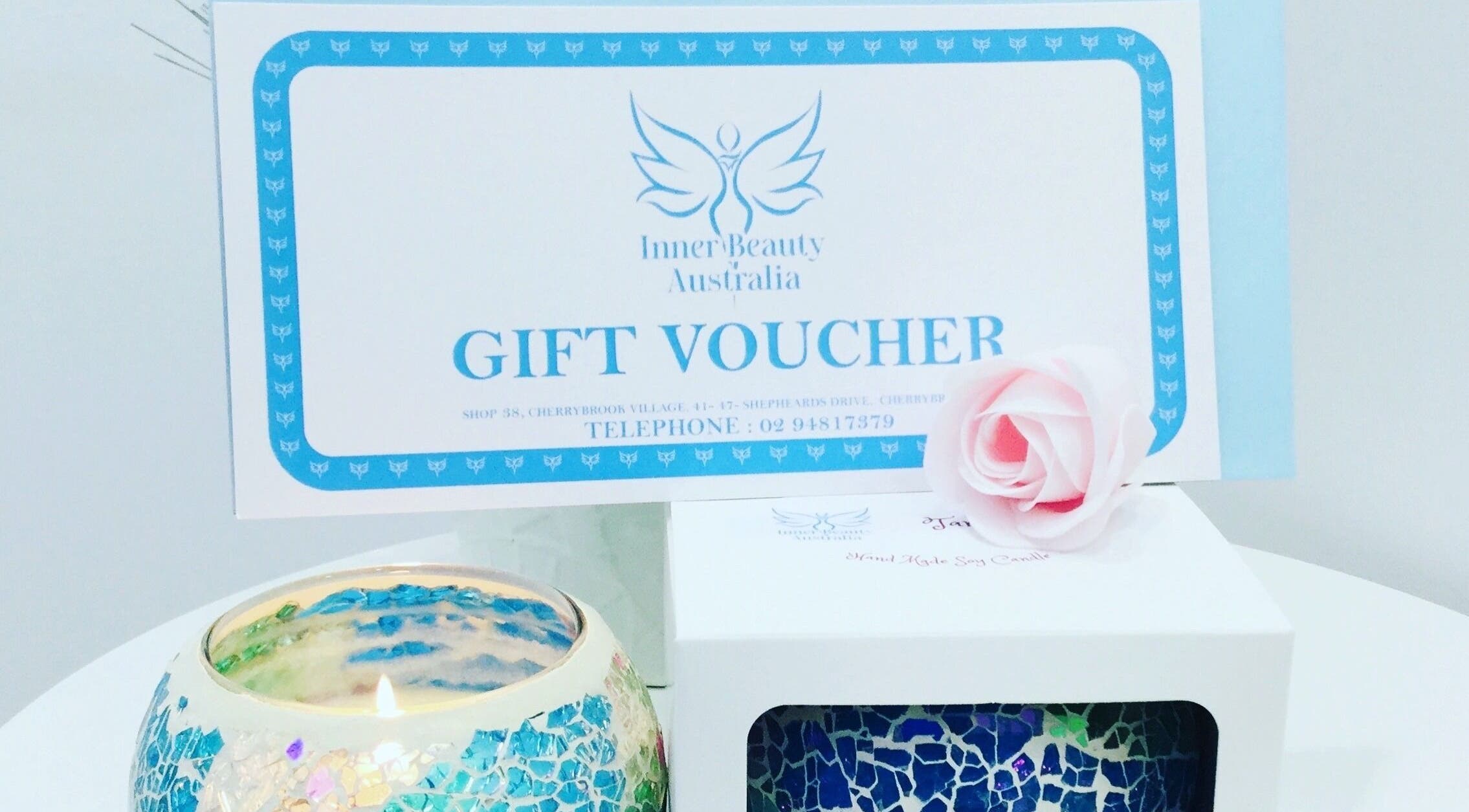 Gift voucher and candle from Inner Beauty Australia, Beecroft, New South Wales, AU offer a serene experience.