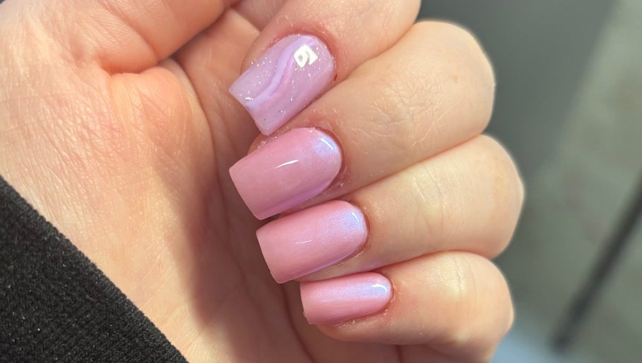 Light pink acrylic nails with a glossy finish at Bei Beauty, Ahoghill, Northern Ireland, GB.