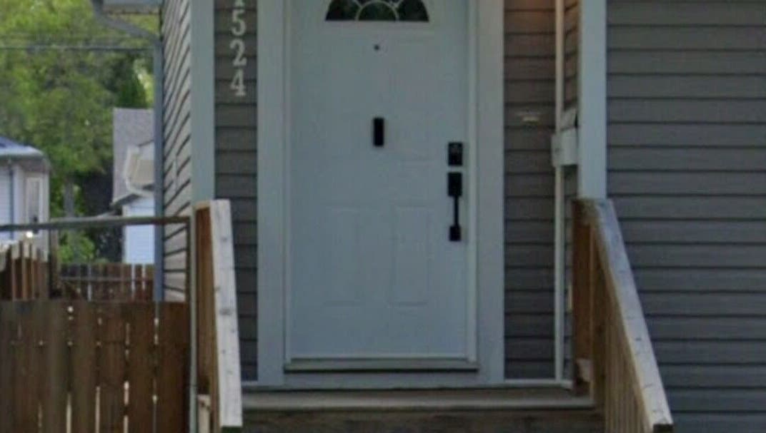 Front entrance of Sore Muscles Solution Ltd. in Edmonton, Alberta, CA, showcasing a charming doorway.