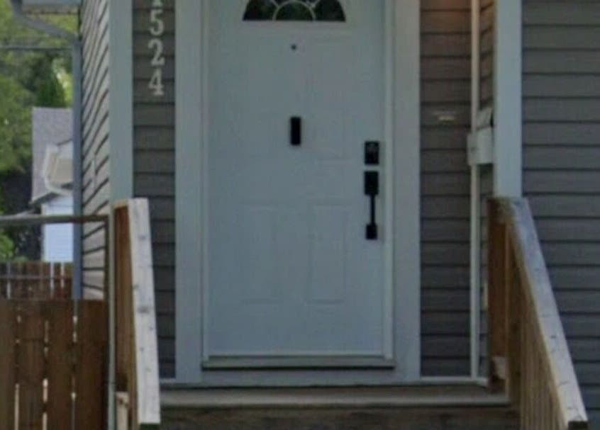 Front entrance of Sore Muscles Solution Ltd. in Edmonton, Alberta, CA, showcasing a charming doorway.